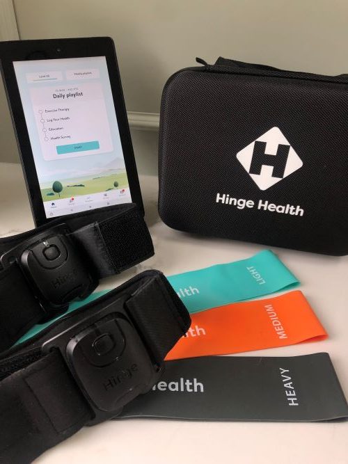 Hinge Health physical therapy kit with Kindle tablet, resistance bands, sensors, and case